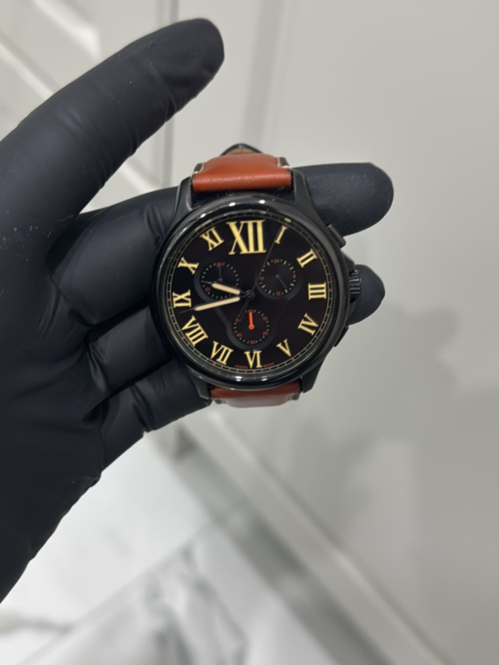 Fossil Black Dial Watch with Brown Leather Strap and Gold Accents